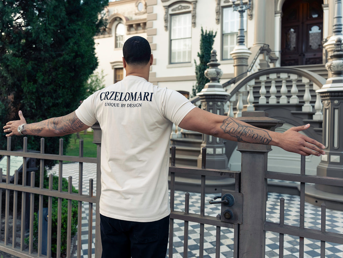 Back of the cream Founders Tee with CRZELOMARI Unique by Design print