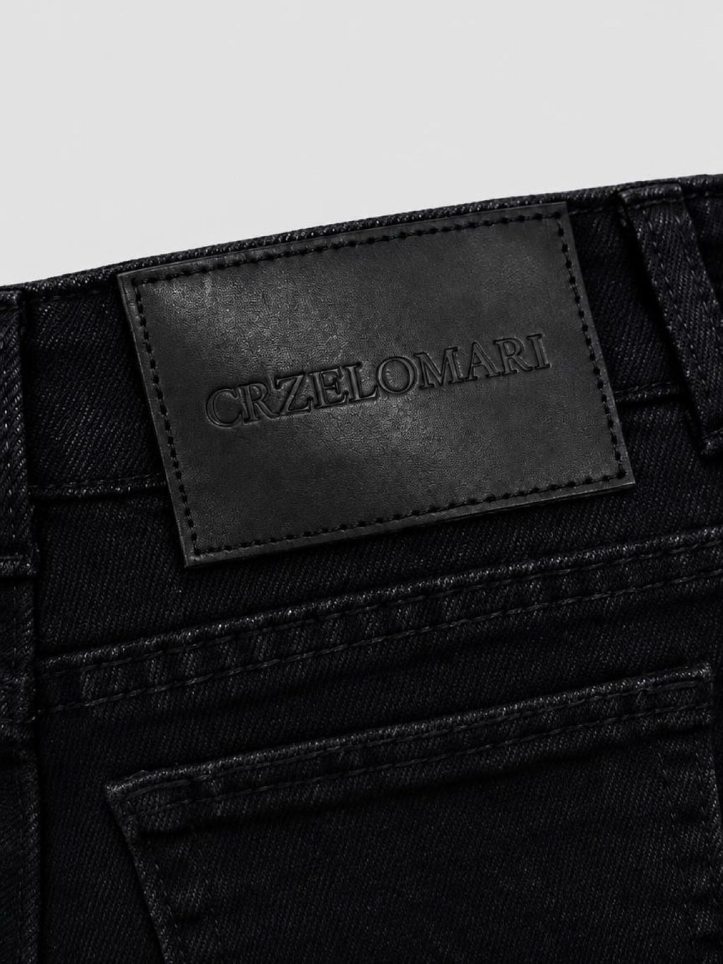Back waistband patch on CRZELOMARI Form Denim black tall jeans