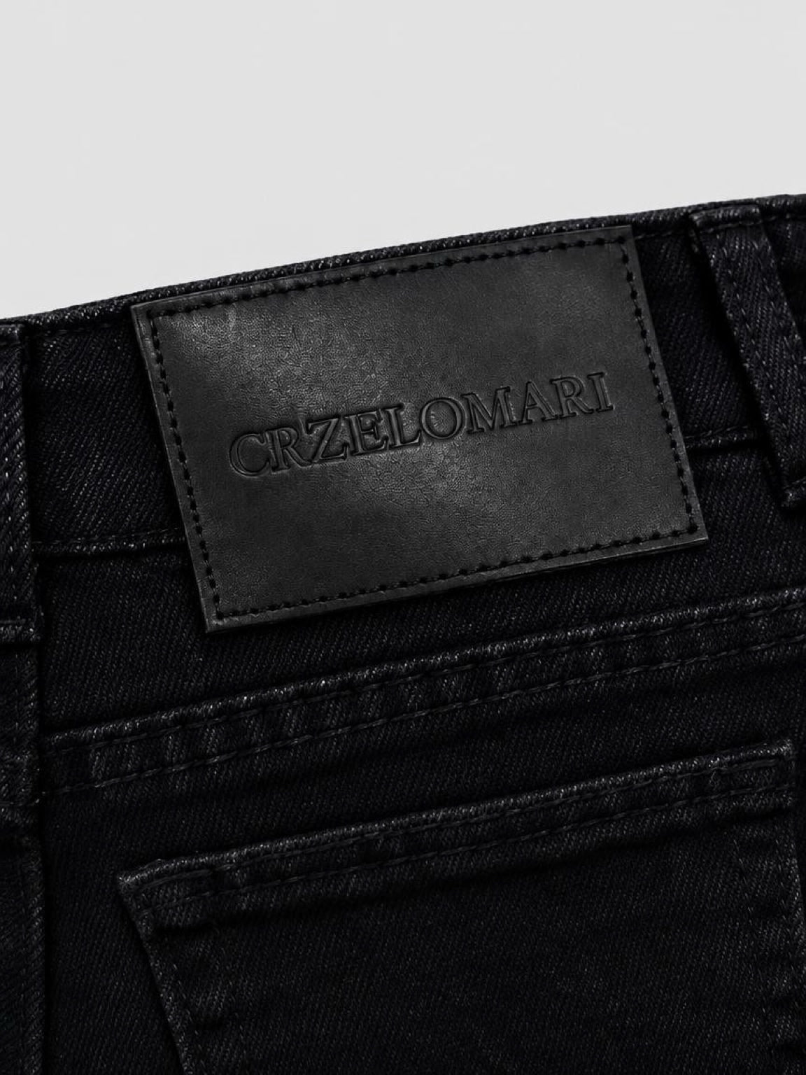 Back waistband patch on CRZELOMARI Form Denim black tall jeans