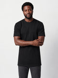 Tall athletic man wearing The Founders Tee in black, an athletic fit tall T-shirt for men