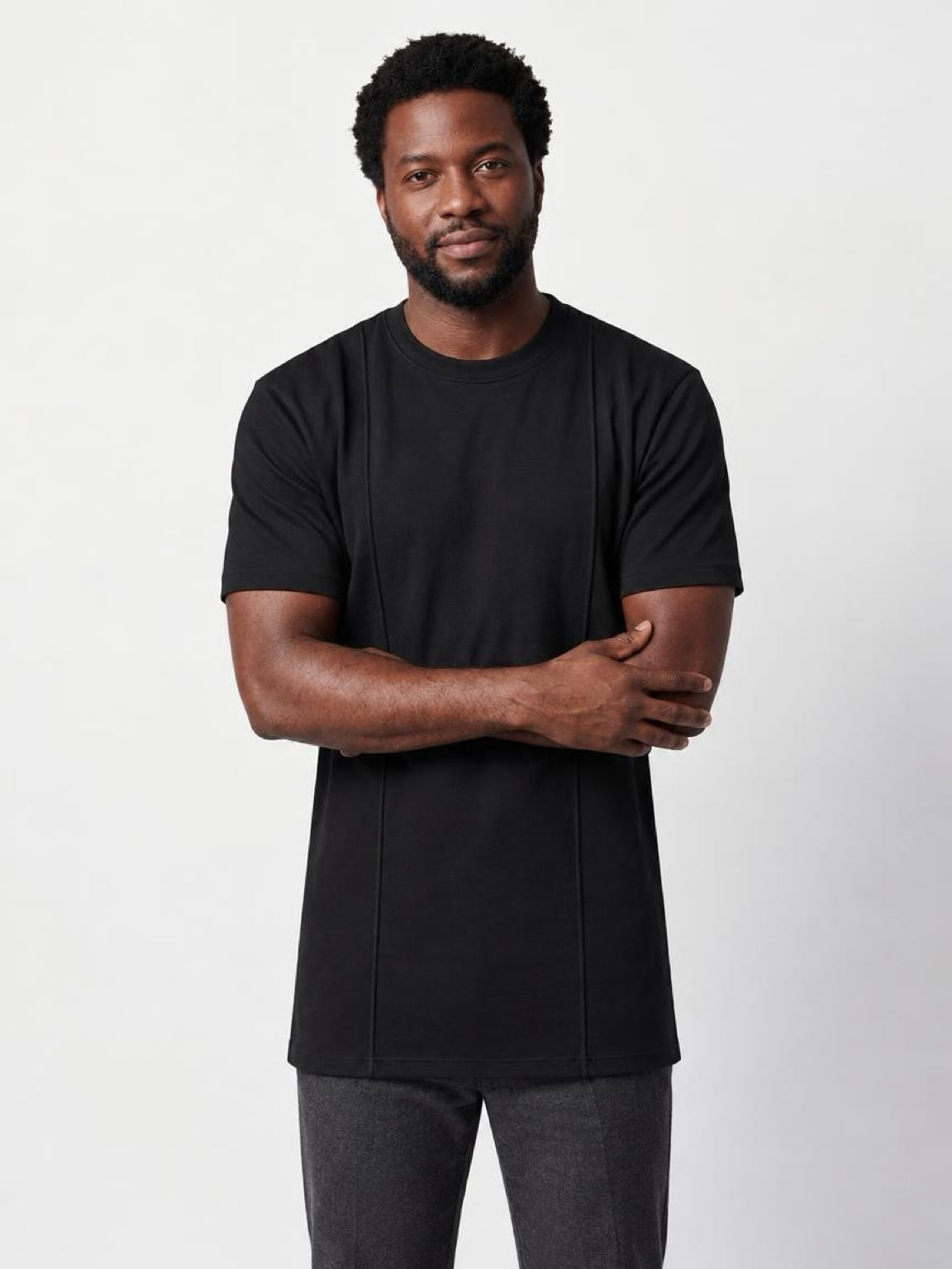 Tall athletic man wearing The Founders Tee in black, an athletic fit tall T-shirt for men